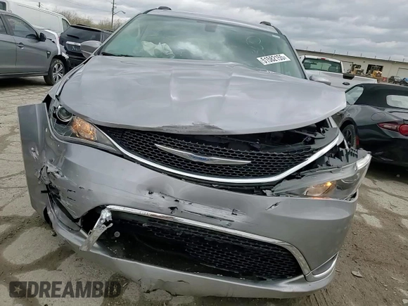 2018 Chrysler Pacifica Touring L with VIN 2C4RC1BG3JR217693, listed as a Copart auction lot 51582155 with 113,107 mi miles and Salvage Title. Bid and sale history available at DreamBid. Image 11.