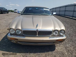 1999 Jaguar XJ with VIN SAJKD6042XC876937, listed as a Copart auction lot 66366064 with 121,747 mi miles and Clean Title. Bid and sale history available at carsss.com. Image 5.
