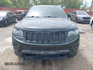 2015 Jeep Grand Cherokee Altitude z VIN 1C4RJFAG5FC682058, wystawiony jako IAAI lot #42352814 z przebiegiem 228 067 mil mil oraz . Historia ofert i sprzedaży dostępna na DreamBid. Obrazek 12.