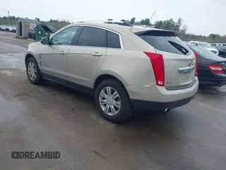 2011 Cadillac SRX Luxury Collection with VIN 3GYFNAEY4BS663447, listed as a IAAI auction lot 42134933 with 153,411 mi miles and . Bid and sale history available at DreamBid. Image 3.