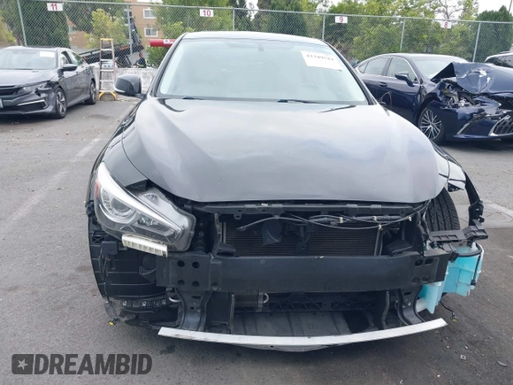 2015 Infiniti Q50 z VIN JN1BV7AP3FM336566, wystawiony jako IAAI lot #42349544 z przebiegiem 84 077 mil mil oraz . Historia ofert i sprzedaży dostępna na DreamBid. Obrazek 6.