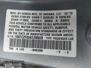 2019 Honda Civic Sedan Sport with VIN 19XFC2F85KE200828, listed as a IAAI auction lot 41807119 with 76,490 mi miles. Bid and sale history available at carsss.com. Image 9.