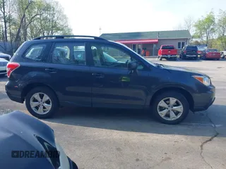 2015 Subaru Forester 2.5i with VIN JF2SJABCXFH599231, listed as a IAAI auction lot 42166220 with 60,409 mi miles and . Bid and sale history available at DreamBid. Image 14.
