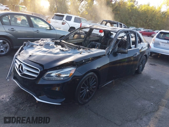 2014 Mercedes-Benz E 550 Sport with VIN WDDHF9BB0EA820235, listed as a IAAI auction lot 40606923 with Not Provided miles and . Bid and sale history available at DreamBid. Image 2.