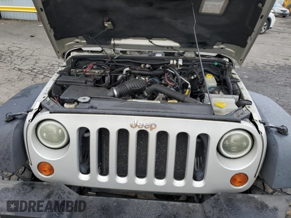 2007 Jeep Wrangler Unlimited X with VIN 1J4GA39177L105582, listed as a Copart auction lot 88912935 with 156,156 mi miles and Salvage Title. Bid and sale history available at DreamBid. Image 13.