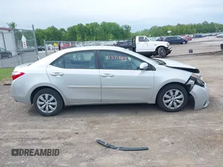 2015 Toyota Corolla L z VIN 2T1BURHE2FC284845, wystawiony jako IAAI lot #42371864 z przebiegiem 133 098 mil mil oraz . Historia ofert i sprzedaży dostępna na DreamBid. Obrazek 13.