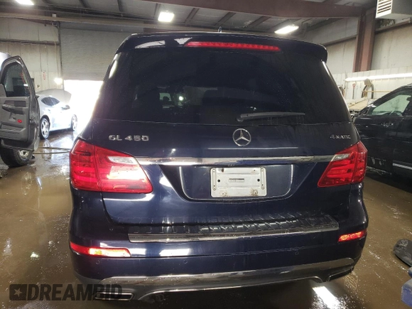 2014 Mercedes-Benz GL 450 z VIN 4JGDF7CE9EA345301, wystawiony jako Copart lot #49129005 z przebiegiem 120 981 mil mil oraz Szkoda całkowita • Salvage title. Historia ofert i sprzedaży dostępna na DreamBid. Obrazek 6.
