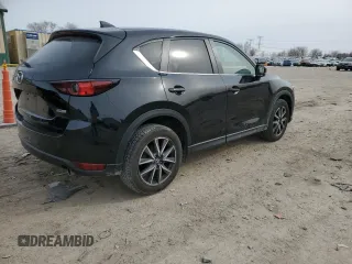 2018 Mazda CX-5 Touring with VIN JM3KFBCM2J0427786, listed as a Copart auction lot 45539345 with 62,989 mi miles and Salvage Title. Bid and sale history available at carsss.com. Image 3.