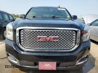 2015 GMC Yukon Denali with VIN 1GKS2CKJXFR547358, listed as a Copart auction lot 63906734 with 163,980 mi miles and Salvage Title. Bid and sale history available at carsss.com. Image 5.