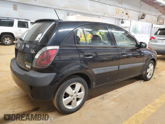 2009 Kia Rio LX with VIN KNADE243896580883, listed as a Copart auction lot 43735505 with 135,726 mi miles and Salvage Title. Bid and sale history available at carsss.com. Image 3.