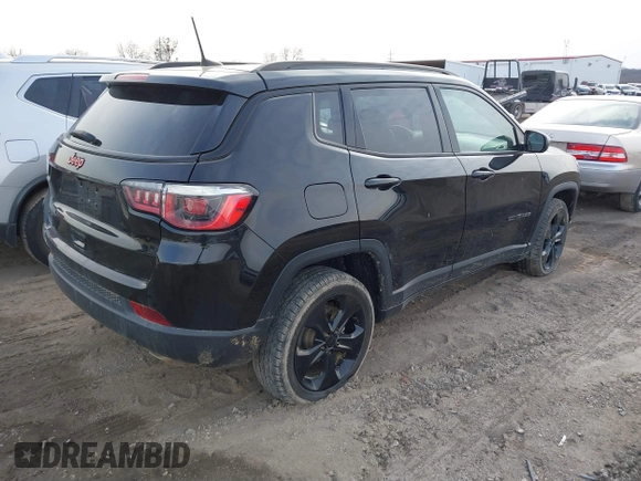 2020 Jeep Compass Latitude with VIN 3C4NJDBB9LT137387, listed as a IAAI auction lot 41379552 with 79,083 mi miles and . Bid and sale history available at carsss.com. Image 4.