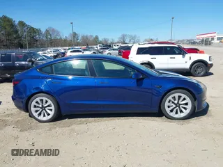 2021 Tesla Model 3 Long Range with VIN 5YJ3E1EB3MF031457, listed as a IAAI auction lot 41630758 with 71,113 mi miles and . Bid and sale history available at carsss.com. Image 13.