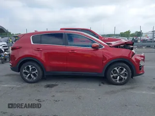 2020 Kia Sportage LX z VIN KNDPM3ACXL7787936, wystawiony jako IAAI lot #42232344 z przebiegiem 45 061 mil mil oraz . Historia ofert i sprzedaży dostępna na DreamBid. Obrazek 13.