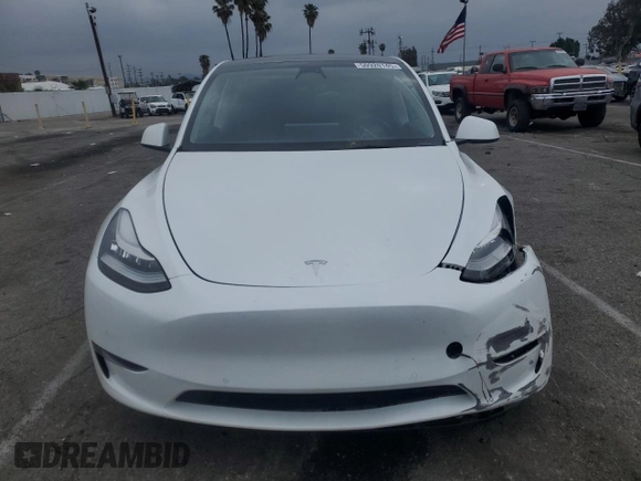 2023 Tesla Model Y Long Range with VIN 7SAYGDEE3PF583883, listed as a Copart auction lot 50920145 with 72,155 mi miles and Salvage Title. Bid and sale history available at DreamBid. Image 5.