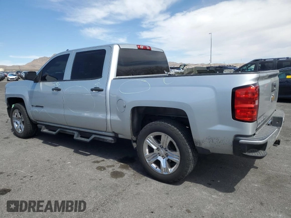 2018 Chevrolet Silverado 1500 Custom with VIN 3GCPCPEH0JG134579, listed as a Copart auction lot 50581845 with 125,133 mi miles and Salvage Title. Bid and sale history available at DreamBid. Image 2.