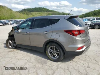 2018 Hyundai Santa Fe 2.4L z VIN 5NMZTDLB9JH079656, wystawiony jako Copart lot #54256175 z przebiegiem 100 678 mil mil oraz Szkoda całkowita • Salvage title. Historia ofert i sprzedaży dostępna na DreamBid. Obrazek 2.