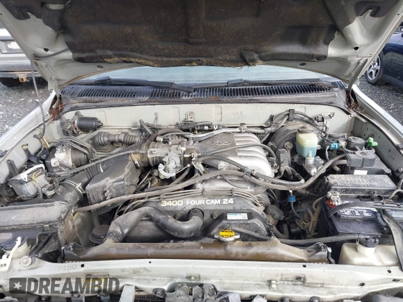 1999 Toyota 4Runner SR5 z VIN JT3HN86R0X0196528, wystawiony jako IAAI lot #41666499 z przebiegiem 294 216 mil mil oraz . Historia ofert i sprzedaży dostępna na DreamBid. Obrazek 10.