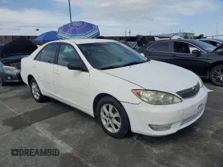 2004 Toyota Camry LE with VIN 4T1BE32KX4U379593, listed as a Copart auction lot 53391455 with 221,056 mi miles and Salvage Title. Bid and sale history available at carsss.com. Image 4.