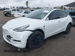 2023 Tesla Model Y Long Range with VIN 7SAYGDEE1PA106057, listed as a IAAI auction lot 41778642 with 1 mi miles. Bid and sale history available at carsss.com. Image 20.