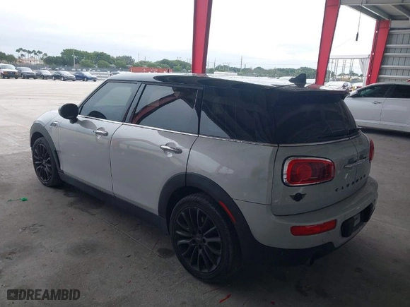 2019 MINI Cooper Clubman with VIN WMWLN5C53K2E34830, listed as a IAAI auction lot 41419983 with 64,716 mi miles. Bid and sale history available at carsss.com. Image 3.