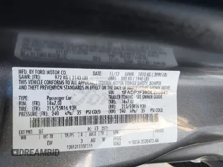 2013 Ford Focus SE z VIN 1FADP3F28DL206541, wystawiony jako IAAI lot #41639697 z przebiegiem 109 828 mil mil oraz . Historia ofert i sprzedaży dostępna na DreamBid. Obrazek 9.