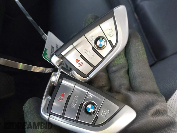 2018 BMW 5 Series 530e with VIN WBAJA9C58JB252398, listed as a IAAI auction lot 42070548 with Not provided miles and . Bid and sale history available at DreamBid. Image 11.
