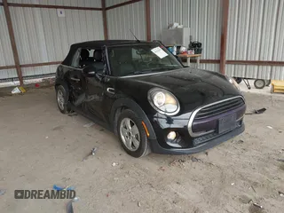 2019 MINI Convertible Cooper z VIN WMWWG5C5XK3H08526, wystawiony jako IAAI lot #41623619 z przebiegiem 53 474 mil mil oraz . Historia ofert i sprzedaży dostępna na DreamBid. Obrazek 1.