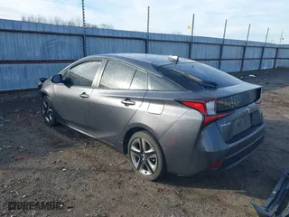 2021 Toyota Prius L Eco with VIN JTDKAMFU1M3149965, listed as a IAAI auction lot 38641916 with 69,942 mi miles. Bid and sale history available at carsss.com. Image 3.