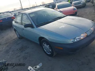 1997 Saturn SL with VIN 1G8ZH528XVZ196784, listed as a IAAI auction lot 41662187 with 112,278 mi miles. Bid and sale history available at carsss.com. Image 1.