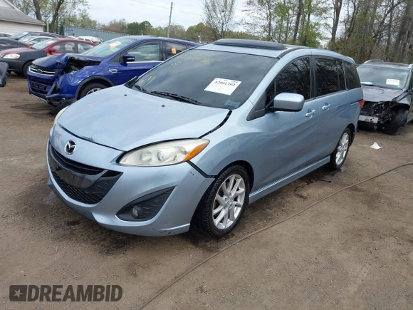 2012 Mazda 5 Grand Touring with VIN JM1CW2DL4C0141511, listed as a IAAI auction lot 42001392 with 99,097 mi miles and . Bid and sale history available at carsss.com. Image 17.