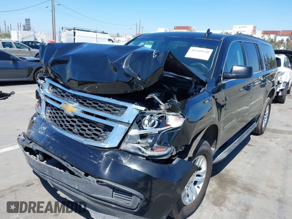 2018 Chevrolet Suburban LS z VIN 1GNSKGKC6JR150248, wystawiony jako IAAI lot #42219120 z przebiegiem 48 321 mil mil oraz . Historia ofert i sprzedaży dostępna na DreamBid. Obrazek 6.