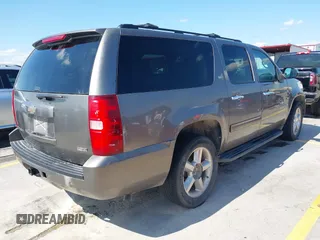 2011 Chevrolet Suburban LT with VIN 1GNSCJE03BR396610, listed as a IAAI auction lot 42348029 with 249,280 mi miles and . Bid and sale history available at DreamBid. Image 4.