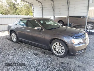 2014 Chrysler 300 C with VIN 2C3CCAKT7EH290150, listed as a Copart auction lot 73772864 with 162,952 mi miles and Salvage Title. Bid and sale history available at DreamBid. Image 4.