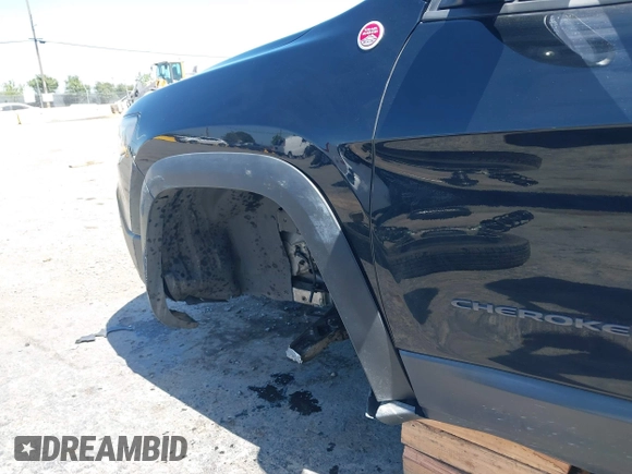 2019 Jeep Cherokee Trailhawk Elite with VIN 1C4PJMBX0KD198328, listed as a IAAI auction lot 42085194 with 76,312 mi miles and . Bid and sale history available at DreamBid. Image 6.