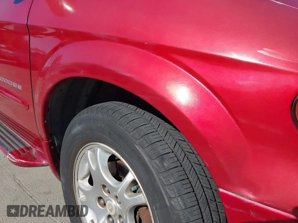 2001 Dodge Grand Caravan with VIN 2B4GT44L31R196487, listed as a IAAI auction lot 41762495 with 164,571 mi miles and . Bid and sale history available at DreamBid. Image 13.