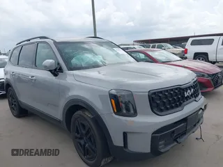 2024 Kia Telluride SX Prestige X-Line z VIN 5XYP5DGC9RG486001, wystawiony jako IAAI lot #41888213 z przebiegiem 22 387 mil mil oraz . Historia ofert i sprzedaży dostępna na DreamBid. Obrazek 1.
