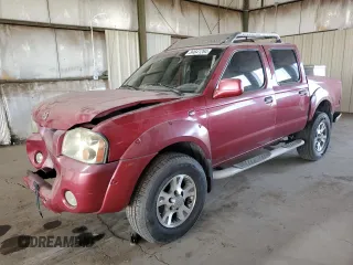 2002 Nissan Frontier SE with VIN 1N6ED27T12C340035, listed as a Copart auction lot 84641264 with 244,274 mi miles and Salvage title. Bid and sale history available at DreamBid. Image 1.