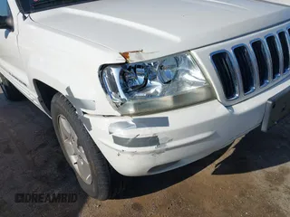 2001 Jeep Grand Cherokee Limited with VIN 1J4GW58S41C615418, listed as a IAAI auction lot 42141143 with 148,145 mi miles. Bid and sale history available at carsss.com. Image 6.