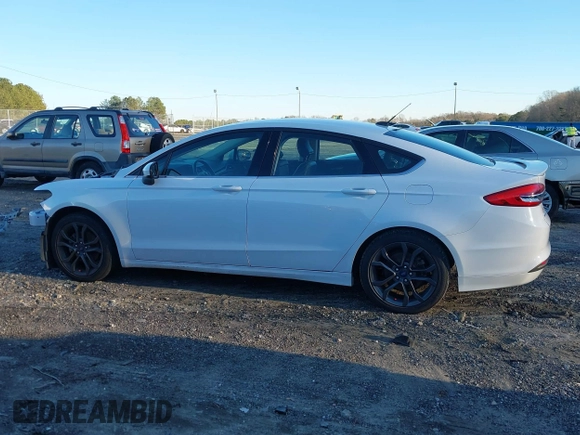 2018 Ford Fusion SE z VIN 3FA6P0H77JR108212, wystawiony jako IAAI lot #41208435 z przebiegiem 68 825 mil mil oraz . Historia ofert i sprzedaży dostępna na DreamBid. Obrazek 15.