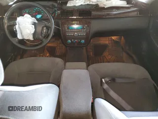 2012 Chevrolet Impala LS Retail with VIN 2G1WA5E30C1258494, listed as a Copart auction lot 82051514 with 128,508 mi miles and Salvage Title. Bid and sale history available at DreamBid. Image 8.