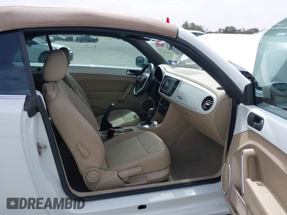 2015 Volkswagen Beetle 1.8T w/Tech with VIN 3VW517AT4FM812294, listed as a IAAI auction lot 41753967 with 59,857 mi miles and . Bid and sale history available at DreamBid. Image 5.