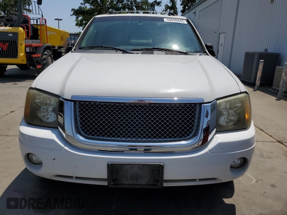 2006 GMC Envoy SLE z VIN 1GKDT13S762345183, wystawiony jako Copart lot #60096645 z przebiegiem 249 658 mil mil oraz Szkoda całkowita • Salvage title. Historia ofert i sprzedaży dostępna na DreamBid. Obrazek 5.