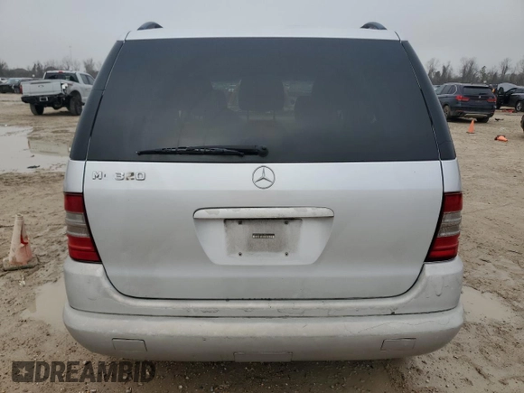 2000 Mercedes-Benz M 320/430/500 z VIN 4JGAB54E8YA214902, wystawiony jako Copart lot #46238825 z przebiegiem Nie podano mil oraz Szkoda całkowita • Salvage title. Historia ofert i sprzedaży dostępna na DreamBid. Obrazek 6.