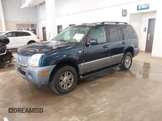 2003 Mercury Mountaineer Convenience z VIN 4M2ZU86W03UJ16828, wystawiony jako IAAI lot #41580919 z przebiegiem 148 968 mil mil oraz . Historia ofert i sprzedaży dostępna na DreamBid. Obrazek 2.