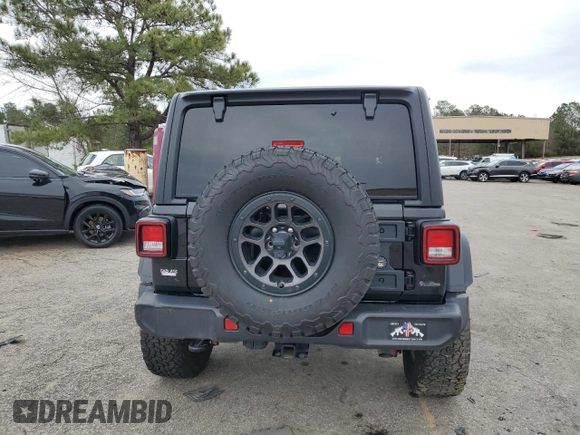 2023 Jeep Wrangler Sport with VIN 1C4HJXDG8PW643414, listed as a Copart auction lot 87768255 with 31,894 mi miles and Salvage Title. Bid and sale history available at DreamBid. Image 6.