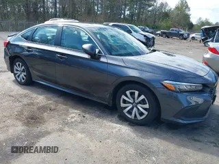 2023 Honda Civic Sedan LX with VIN 2HGFE2F29PH559554, listed as a IAAI auction lot 41506572 with 20,694 mi miles. Bid and sale history available at carsss.com. Image 1.