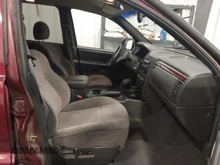 2000 Jeep Grand Cherokee Laredo z VIN 1J4GW48N8YC151600, wystawiony jako IAAI lot #42178535 z przebiegiem 71 207 mil mil oraz . Historia ofert i sprzedaży dostępna na DreamBid. Obrazek 5.
