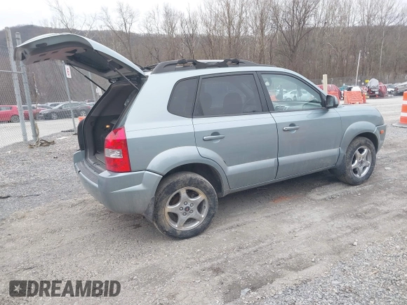 2007 Hyundai Tucson SE with VIN KM8JN12D27U606152, listed as a IAAI auction lot 41465051 with 141,478 mi miles. Bid and sale history available at carsss.com. Image 4.