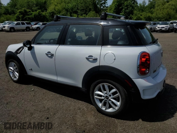 2014 MINI Countryman S z VIN WMWZC5C51EWP35221, wystawiony jako Copart lot #58718545 z przebiegiem 152 809 mil mil oraz Tytuł czysty. Historia ofert i sprzedaży dostępna na DreamBid. Obrazek 2.