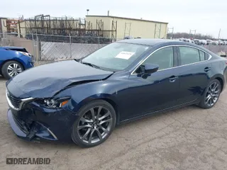 2016 Mazda Mazda6 i Grand Touring with VIN JM1GJ1W57G1486962, listed as a IAAI auction lot 41813471 with 64,078 mi miles. Bid and sale history available at carsss.com. Image 2.